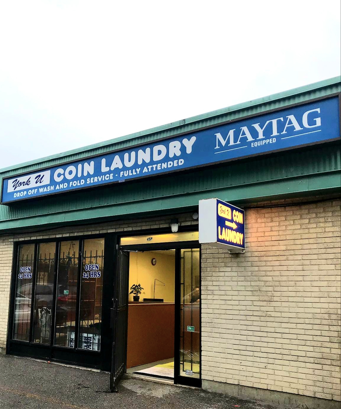 York U Coin Laundry storefront showing the teal signage, Maytag Equipped badge, and welcoming entrance